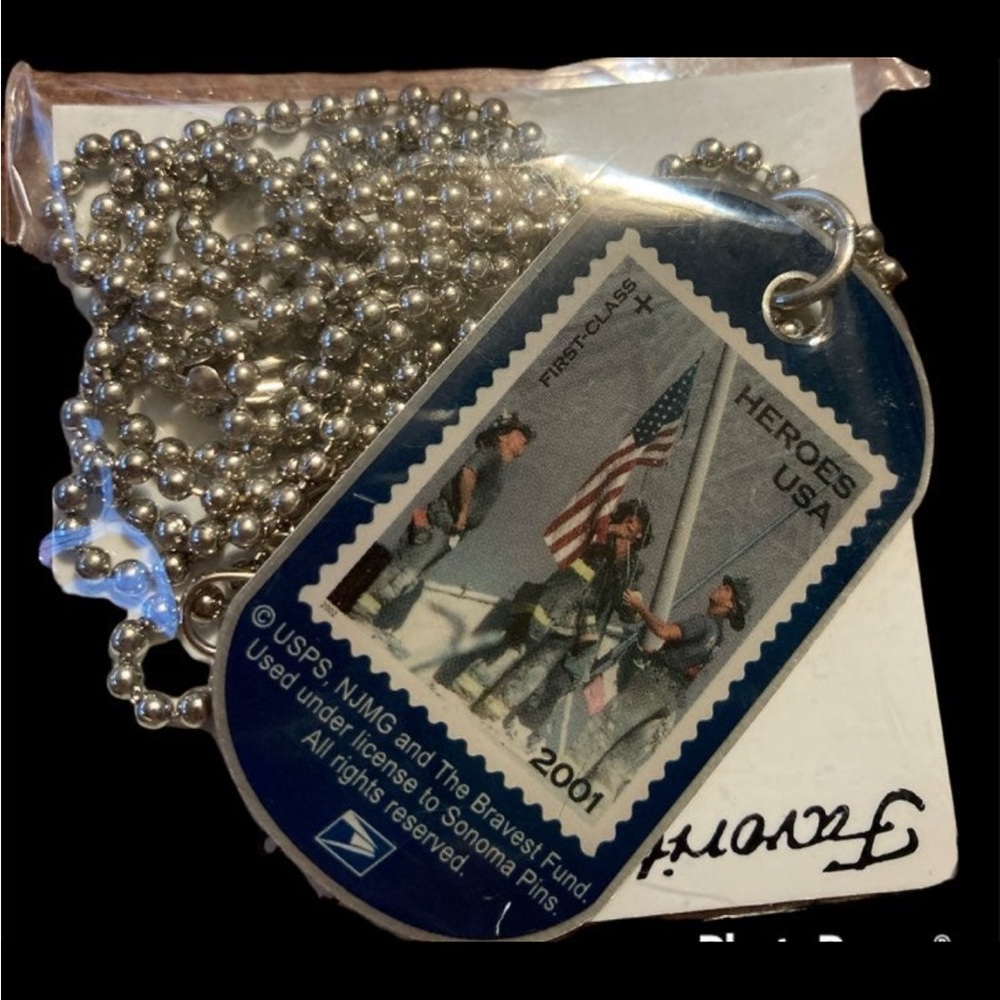 Nip. 2001 Dog Stamp Hero Tag In Package - image 1